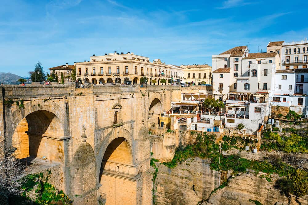 Ronda, Spain, El Tajo Gorge Canyon with new bridge and white spanish houses in Ronda, Andalusia, Spain