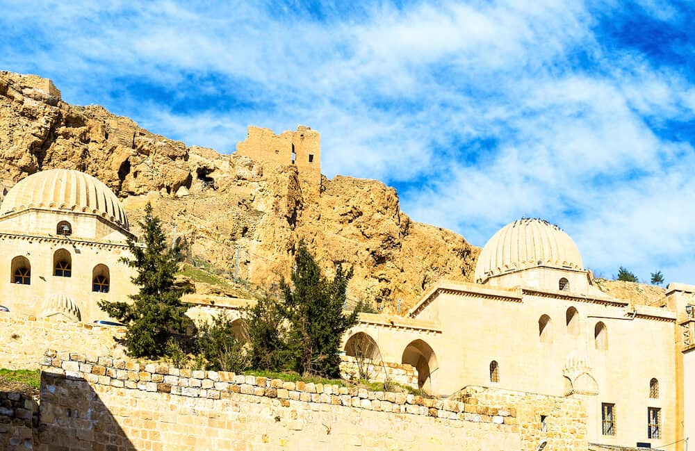 The stone domes of Zinciriye Madrasa located in the upper town of Mardin Turkey.