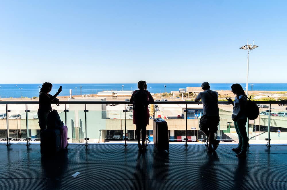 PALERMO, ITALY - passengers wait for their flights on terrace in Falcone Borsellino Airport in Palermo Italy. The airport was named after the two leading anti-mafia judges murdered in 1992.
