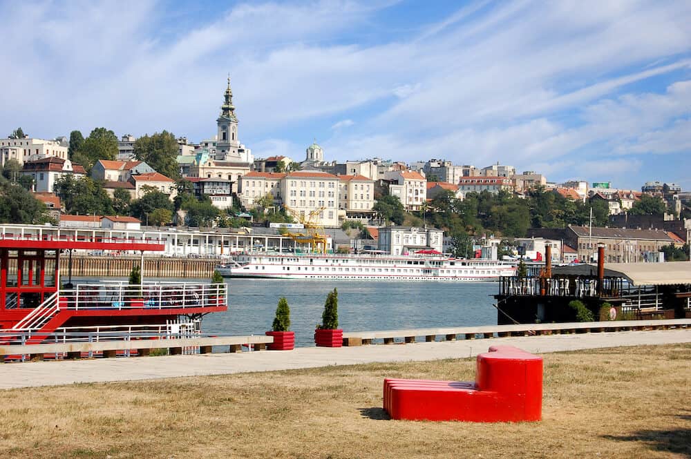 Belgrade Serbia. . Belgrade Old Town. with red park sculpture. View from New Belgrade, on the Sava River, the Belgrade port and the Cathedral Church.