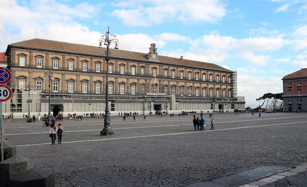NAPLES ITALY - people in Plebiscito square in front of the Royal Palace