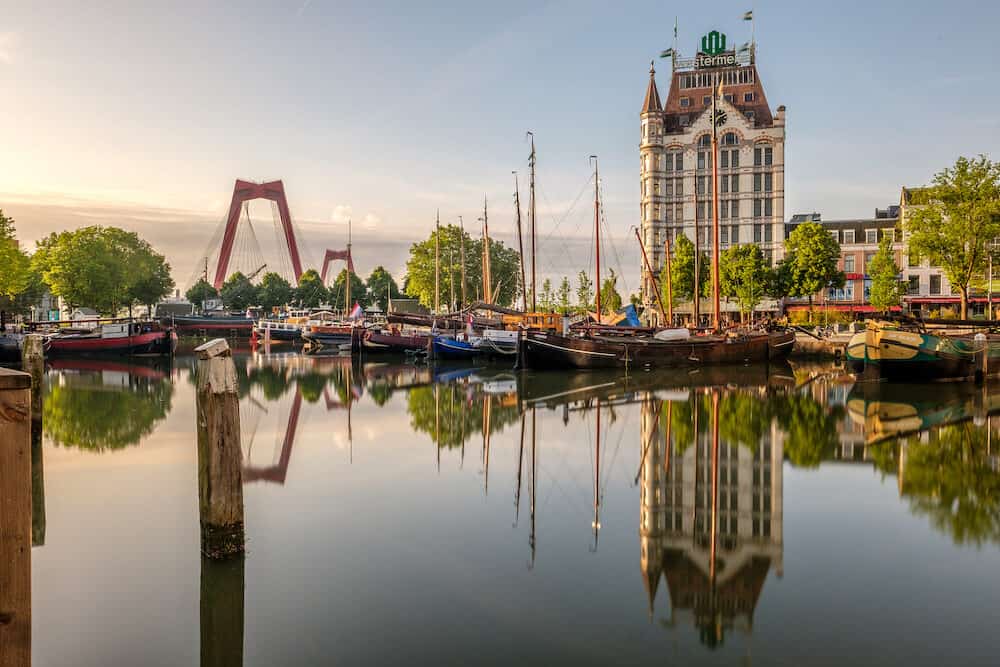 ROTTERDAM - : Rotterdam city cityscape skyline with The Witte Huis (White House) and Willemsbrug bridge, Oude Haven, South Holland, Netherlands.