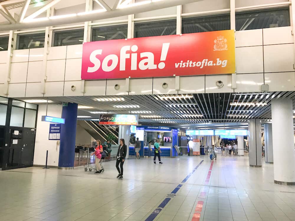 Sofia, Bulgaria - Passengers walking in Sofia Airport Terminal 2. "Sofia Airport" EAD is a licensed airport operator of the largest international airport in Bulgaria.