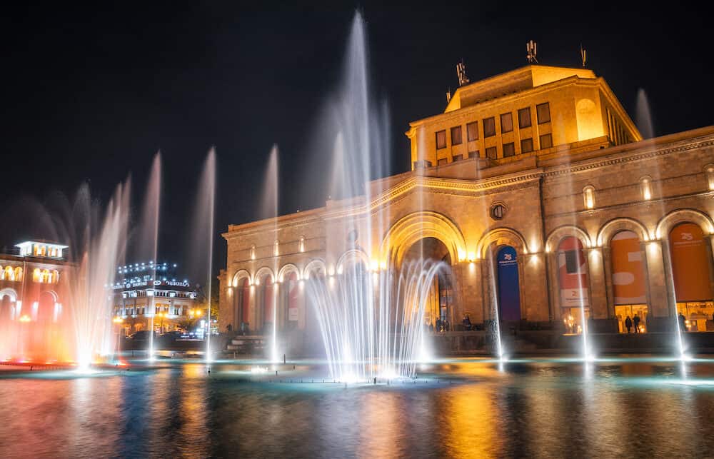 Yerevan Armenia. The colored singing musical dancing fountains against the building of the National Gallery and History Museum of Armenia