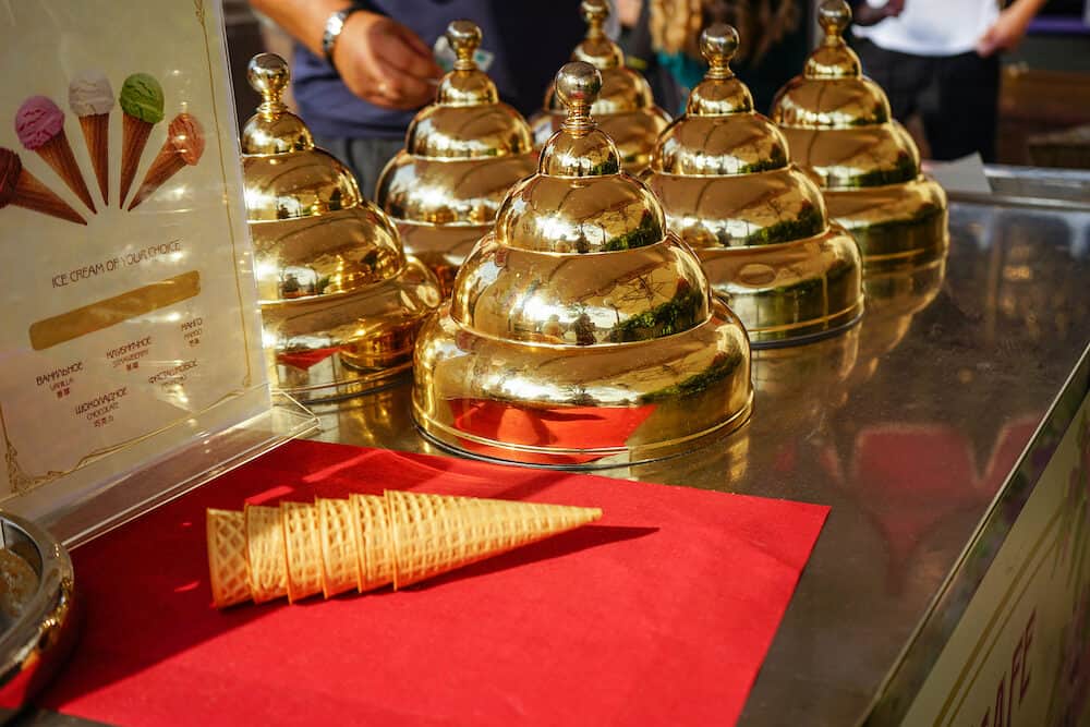 Gold metal cones in the workplace of the seller of ice cream.