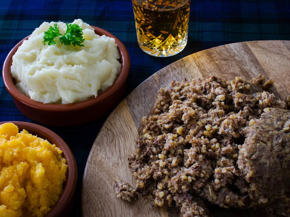Haggis, with mashed potatoes, mashed swede and a wee dram of Scotch whisky. Burns Night, Scotland