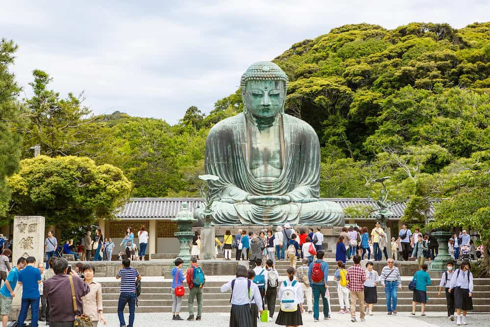 KAMAKURA, JAPAN - The Great Buddha of Kamakura in Kotokuin Temple, Kanagawa, Japan. With a height of 13 meters, it is the second largest bronze Buddha statue in Japan.