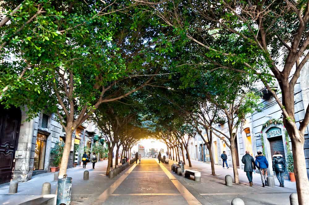 Naples, Italy - famous Via Chiaia street view in Naples, Italy. Naples' historic city centre is the largest in Europe, and is listed by UNESCO as a World Heritage Site