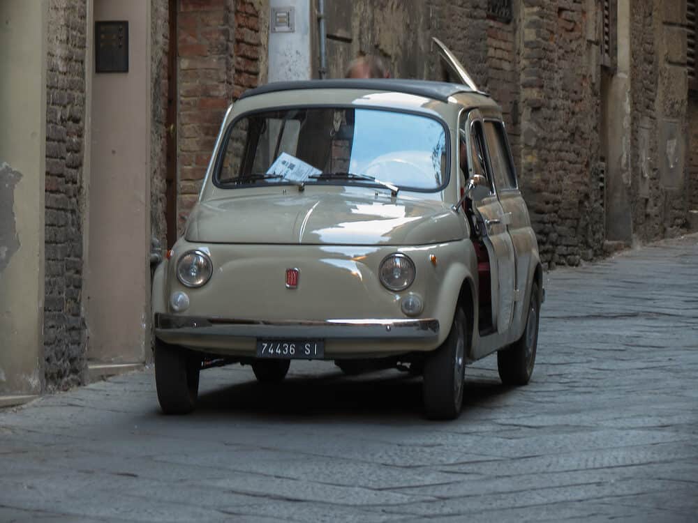 SIENA ITALY - CIRCA - Fiat 500 car station wagon with reversed doors