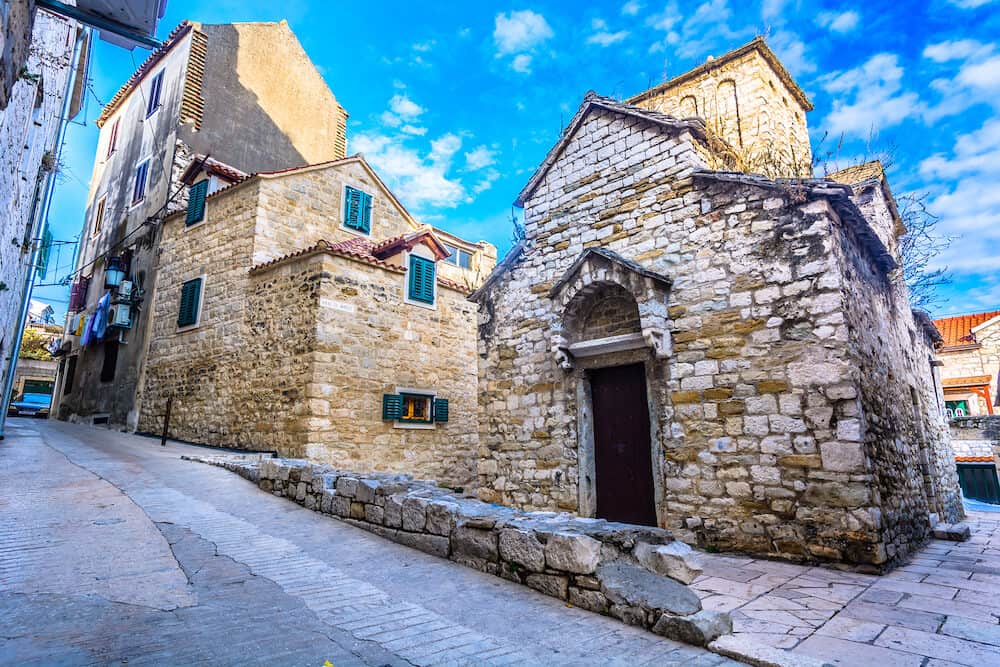Old medieval street in city center of old town Split, popular touristic destination in Croatia.