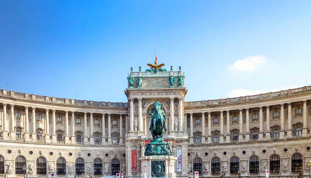 Wien / Austria - the statue of Prince Eugene against Neue burg, the new part of the Hofburg palace in historical part pf Vienna