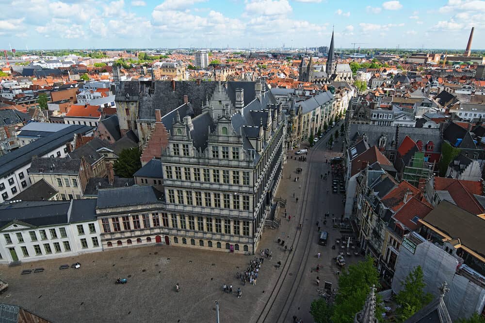 Ghent, Belgium- Aerial view of Ghent from Belfry. City Hall (Stadhuis Gent) and historical buildings of Ghent. Spring landscape photo. Selective focus with wide angle lens.
