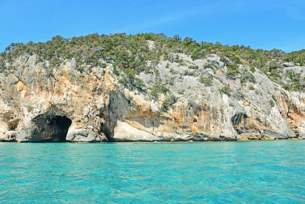 caves and turquoise sea in Cala Gonone