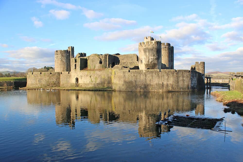 Caerphilly Castle reflected in the lake, Wales