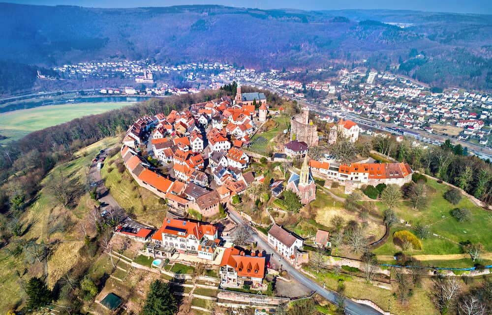 Aerial view of Dilsberg, a town with a castle on the top of a hill surrounded by a Neckar river loop. Germany, Baden-Wurttemberg