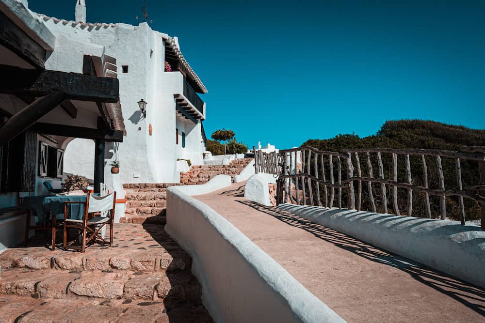 Traditional fishing village of Binibeca on the coast of Menorca, Spain.