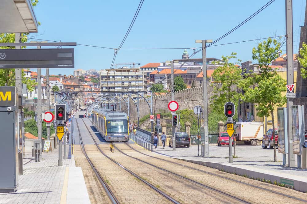Porto, Portugal - Metro of Porto city on Ponte Luis I bridge. Modern tram transportation of Portugal.