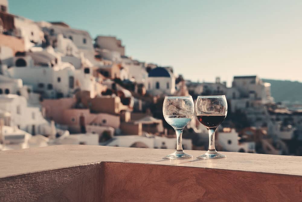 Wine on rooftop in Santorini, Greece.
