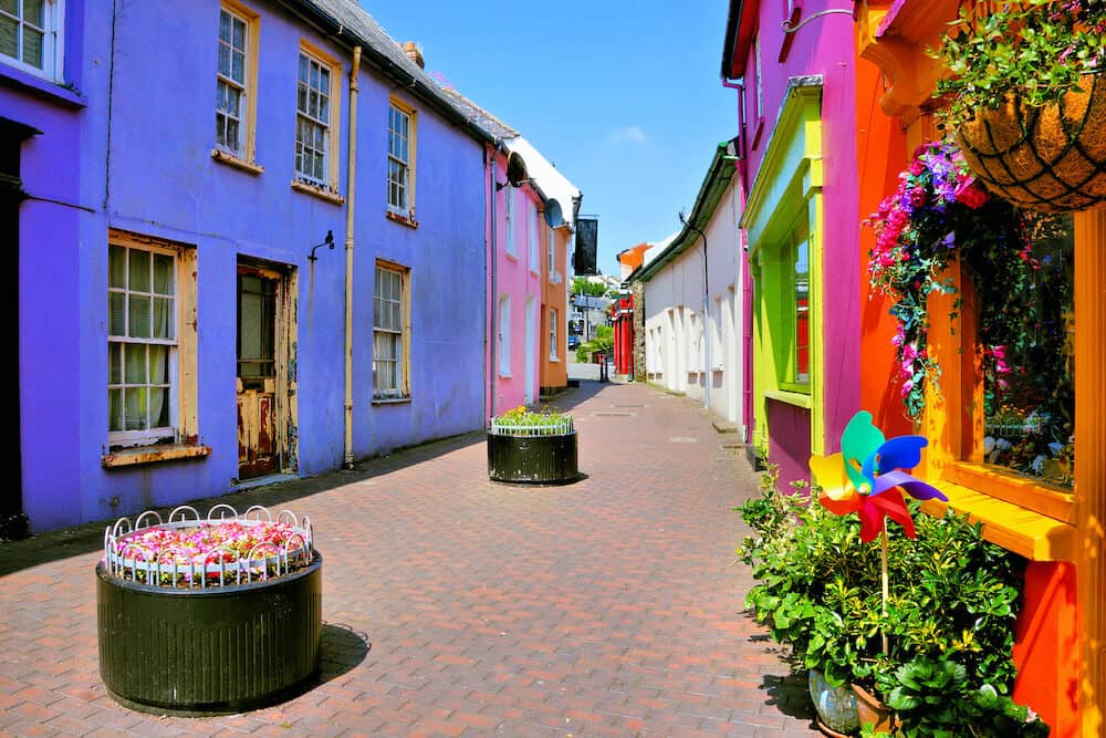 Quaint street lined with vibrant colorful buildings in the Old Town of Kinsale, County Cork, Ireland