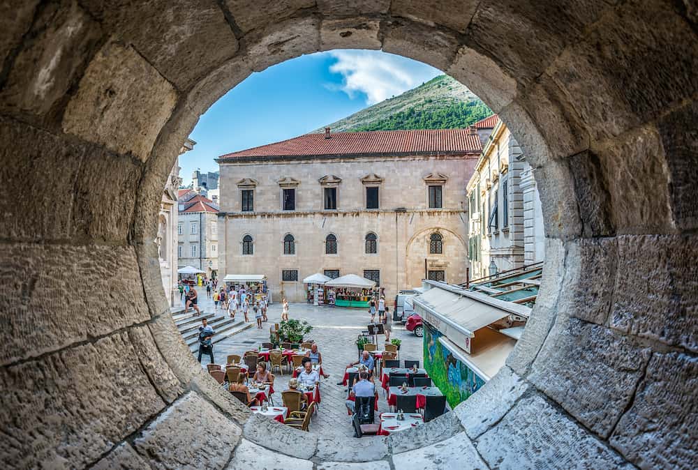 Dubrovnik Croatia - Dubrovnik Croatia. Tourists in restaurant located on the Old Town of Dubrovnik