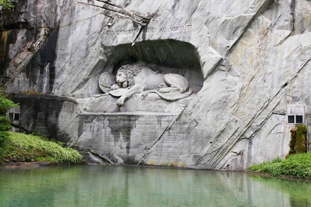 Lucerne, Switzerland - Lewendenkmal, the lion monument. It was carved on the cliff to honor the Swiss Guards of Louis XVI of France. Outdoors,