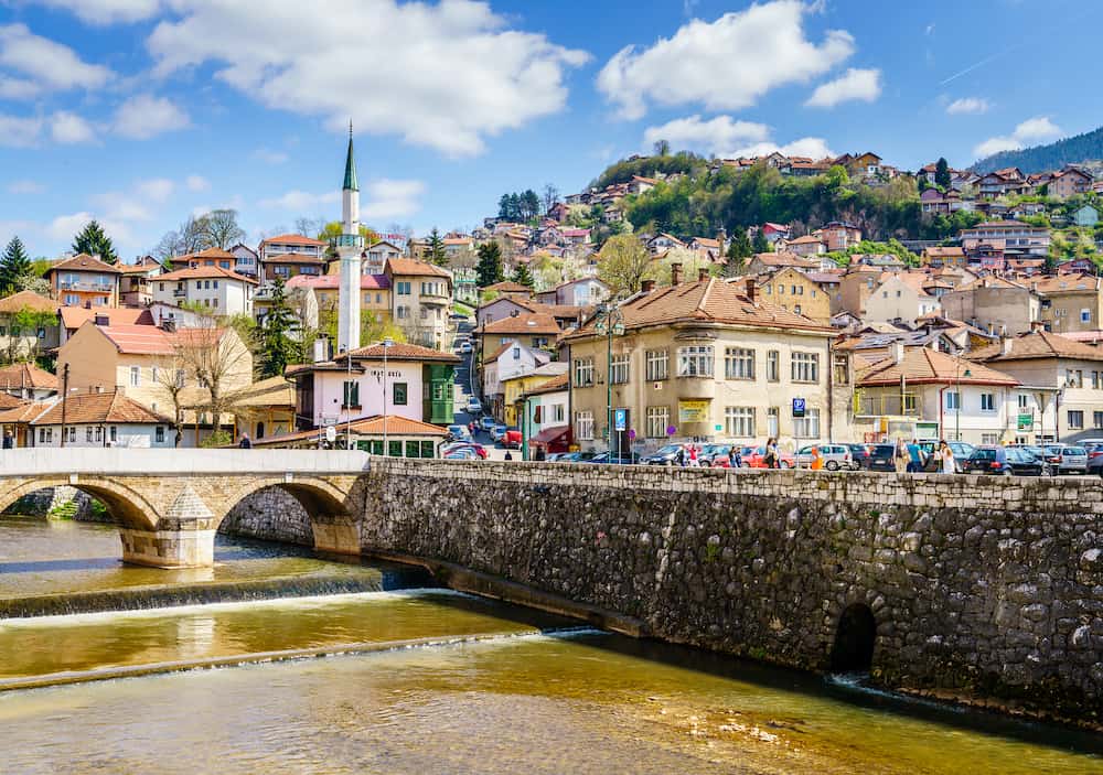 Sarajevo, Bosnia-Herzegovina, Miljacka River embankment in Sarajevo city center on a sunny spring day