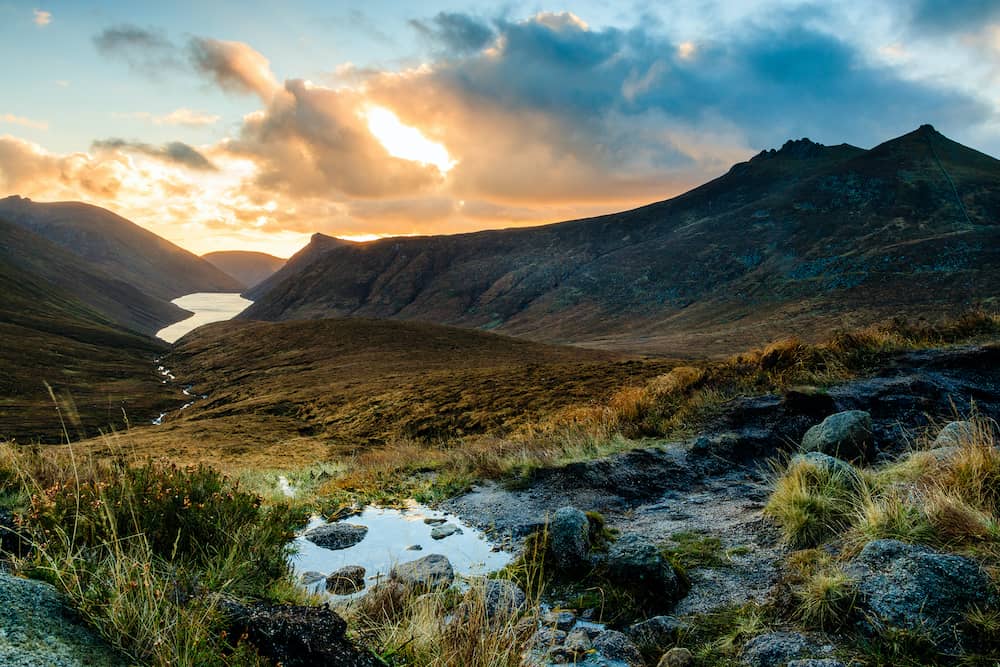Ben Crom Reservoir in the Mourne Mountains, County Down, Northern Ireland, seen at sunset