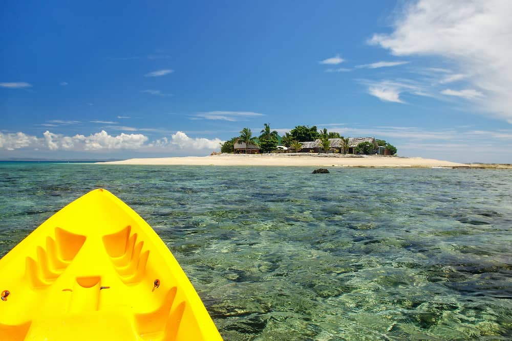 Kayaking near South Sea Island, Mamanuca islands group, Fiji. This group consists of about 20 islands.
