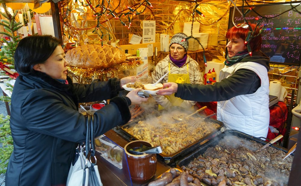 Warsaw - New Year fair in the city, tent food, sell national food.