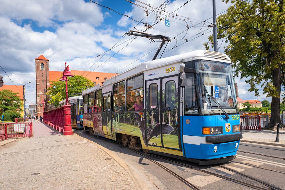WROCLAW, POLAND - The tram on Sand Bridge (Most Piaskowy) in Wroclaw on a summer day.