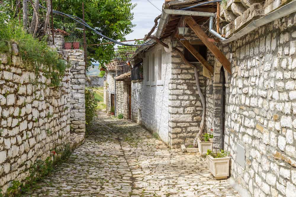 Berat, Albania- Narrow, cobbled streets in the historical town Berat. Ottoman architecture in Albania, Unesco World Heritage Site. Berat, called the city of a thousand windows.