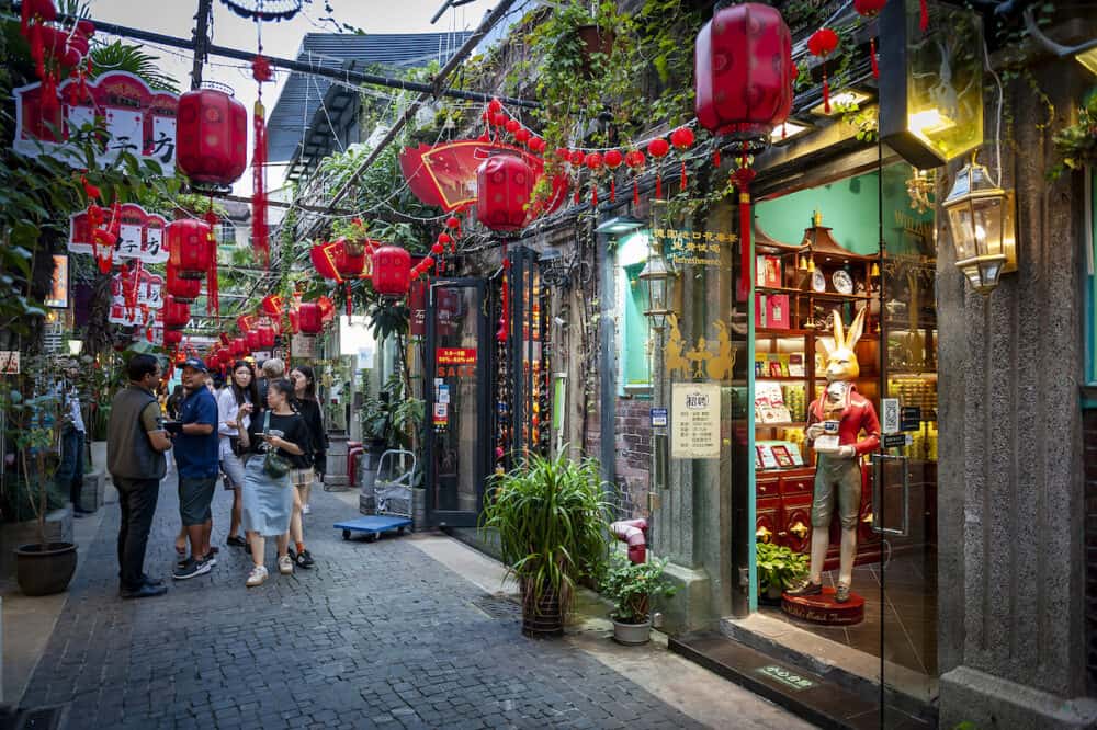Shanghai, China - Tianzifang, a popular tourist destination home to boutique shops, craft stores, trendy art studios, cafes, bars and restaurants along narrow alleys in Shanghai, China