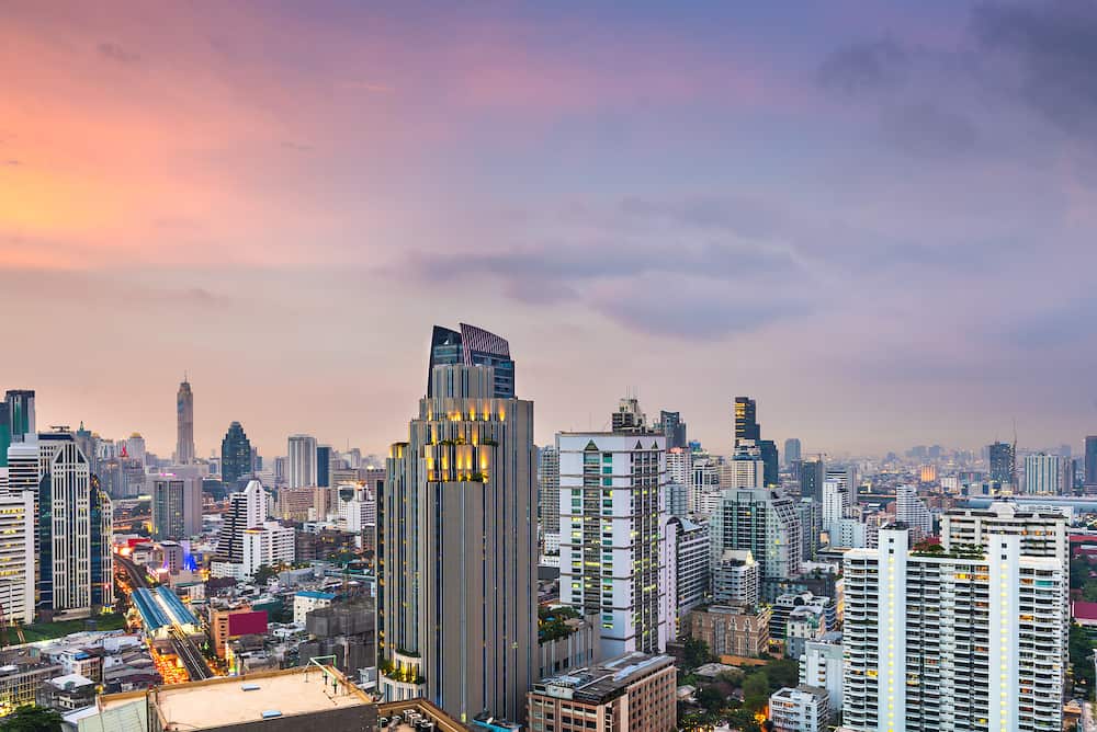 Bangkok, Thailand downtown cityscape from the Sukhumvit District at dusk.