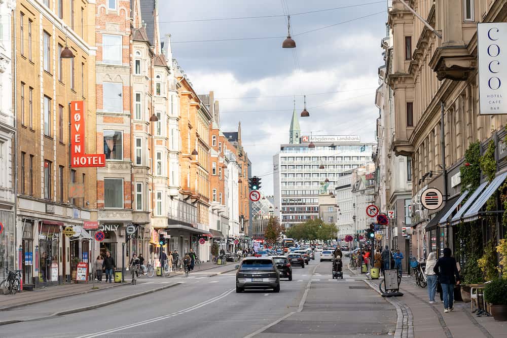 Copenhagen, Denmark - People, cars and shops on Vesterbrogade in Vesterbro district