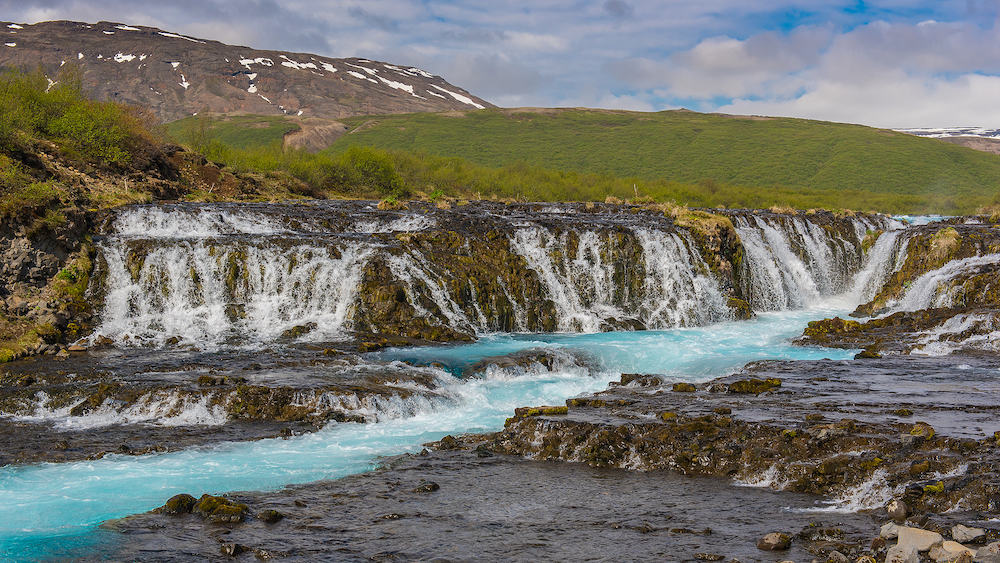 The hidden blue waterfall Bruarfoss in Iceland