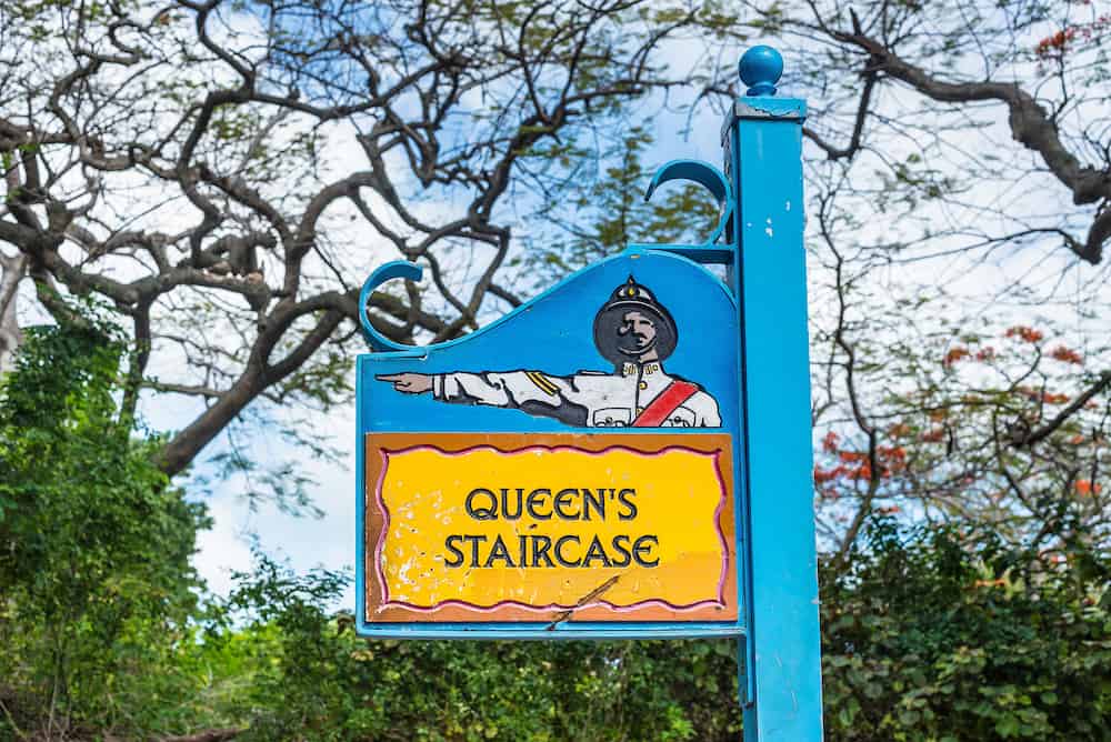 Nassau, Bahamas - The Queen's Staircase sign. The Queen's Staircase, commonly referred to as the 66 steps, is a major landmark that is located in the Fort Fincastle in Nassau.
