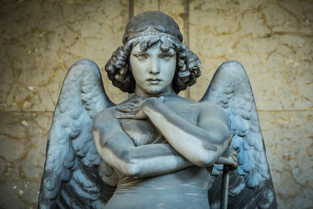 GENOA, ITALY - CIRCA Angel sculpture by Giulio Monteverde for the Oneto family monument in Staglieno Cemetery, Genoa - Italy (1882)