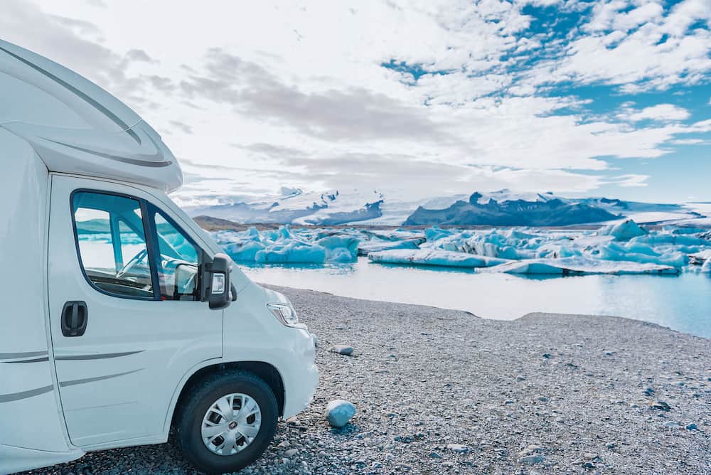 motorhome travel. Road trip in Iceland motorhome driving camping van on adventure vacation Jokulsarlon, Iceland.