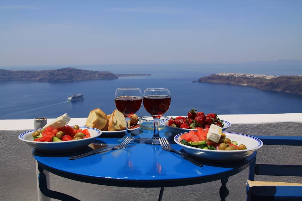 Ideal breakfast with wonderful seaview on caldera, Santorini island, Greece