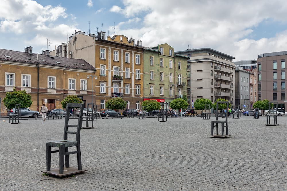 Krakow, Poland - Empty Chairs memorial of Jewish victims of WW2, located at Ghetto Heroes Square