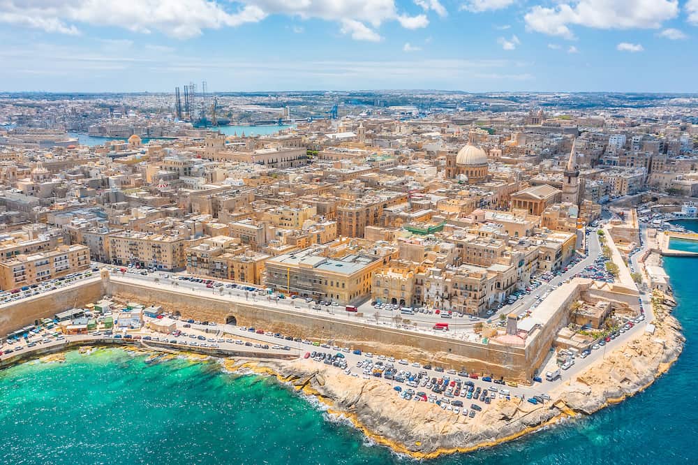 Aerial view of Valletta city - capital of Malta country. Mediterranean sea, blue sky with clouds