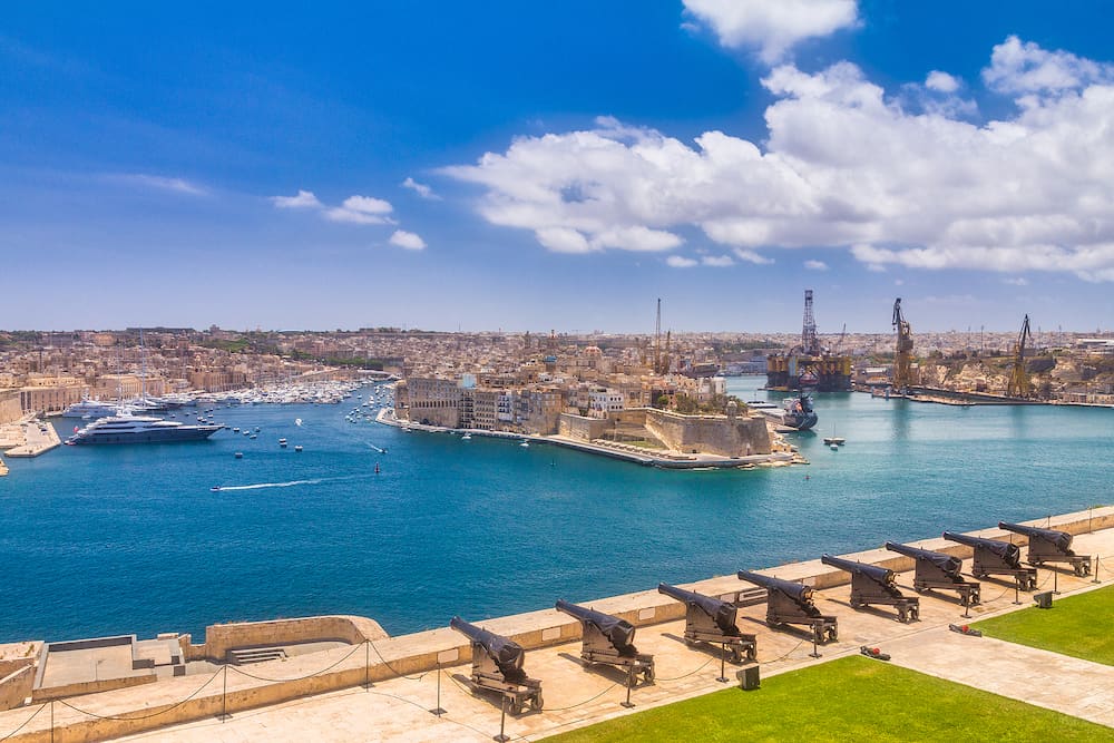 Upper Barrakka Gardens with The Saluting Battery. View of Valletta town with harbor, the capital of Malta, Europe.