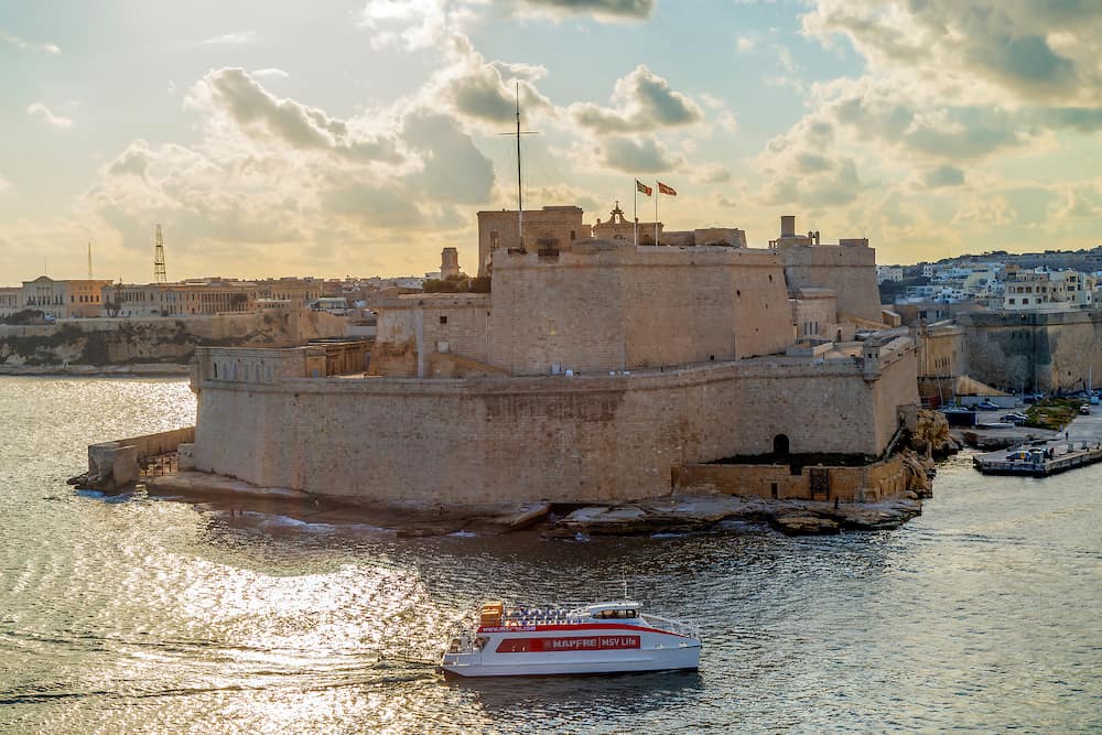 VALLETTA, MALTA - View of the Fort Saint Angelo from one Cruise ship. Morning light.