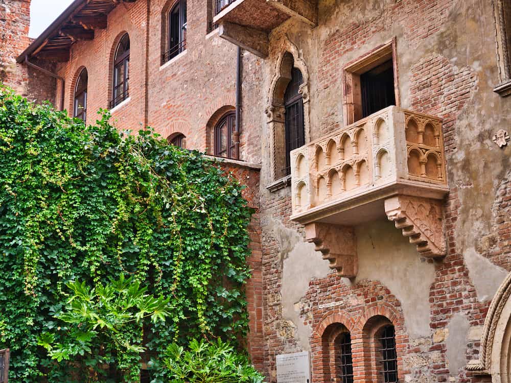 Balcony of Juliet's house in Verona seen from the inner courtyard during the day