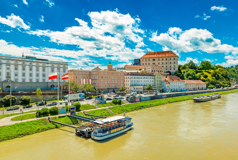 Linz -Austria: Cityscape of Linz with Linzer Castle, colorful historical buildings and the Danube river