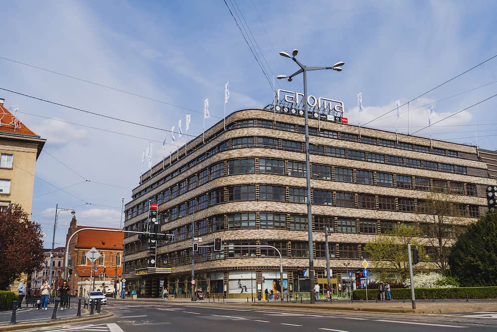 WROCLAW, POLAND - Renoma shopping mall on urban street with sky at background