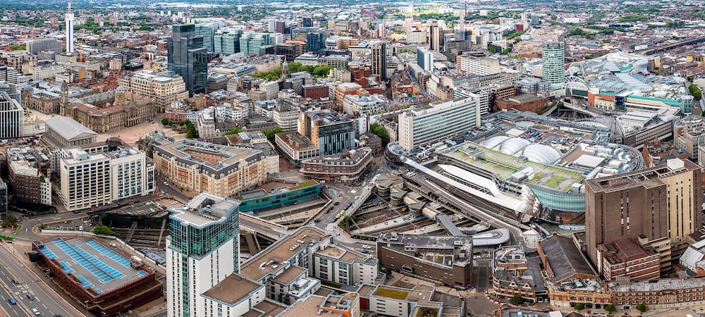 BIRMINGHAM, UK -An aerial view of Birmingham city centre with The Radisson Blu Hotel skyscraper, New Street Train Station and The Bullring shopping Mall