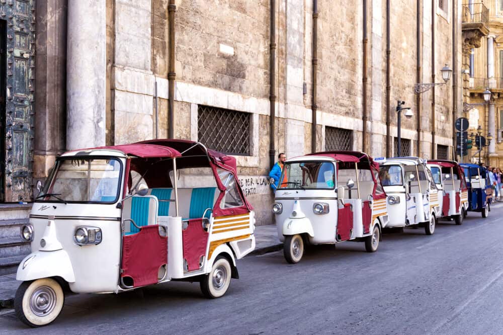 PALERMO, ITALY - Tourist taxi or tricycle taxi in street in Palermo, Sicily, Italy 