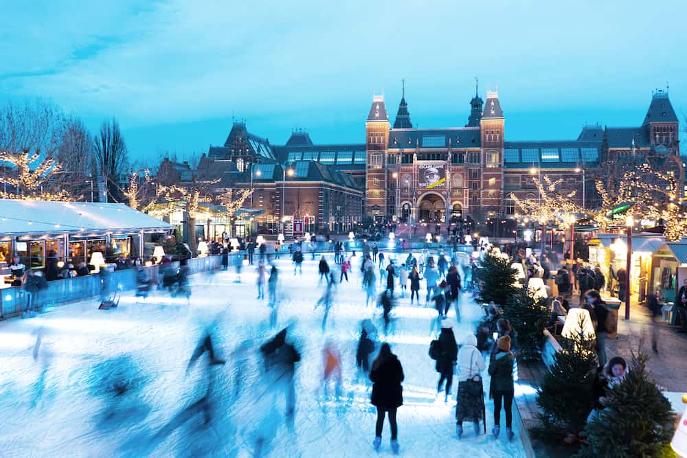 The Netherlands, Amsterdam - winter ice rink in Amsterdam on the museum square, the Netherlands