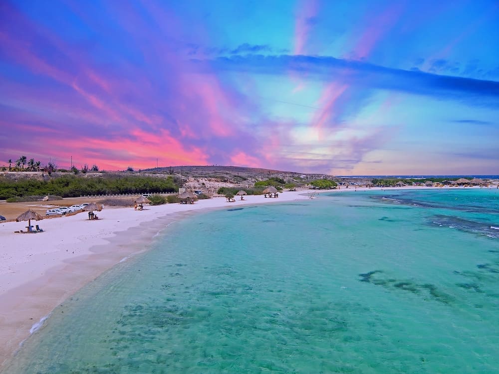 Aerial from Baby beach on Aruba island in the Caribbean Sea at sunset